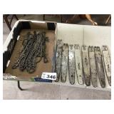 7 12 IN BARS, 1 14 IN BAR, 12 USED CHAINSAW CHAINS