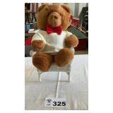 BEAR IN WICKER CHAIR