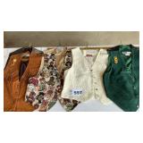 4 WOMENS VESTS.( 2 suede)