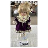BRINNS DOLL ON PRECIOUS MOMENTS STAND