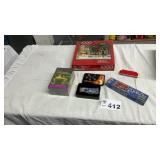 DOMINOES, KNIFE, PUZZLE, AUDIO BOOK, HARMONICA