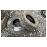 2 USED TIRES, BOTH 15 INCH