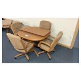 DINING ROOM TABLE W LEAF AND 4 UPHOLSTERED CHAIRS