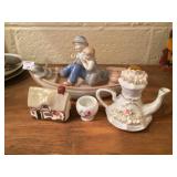 Couple in Boat and other figurines