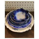 Stack of Various Blue and White Plates