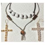 Two Crosses and Two Necklaces