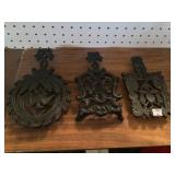 Three Cast Iron Trivets