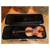 Violin in travel case.