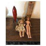 Two Dolls and a Tin Rocket
