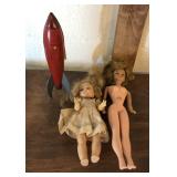 Two Dolls and a Tin Rocket