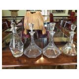 Four Clear Glass Decanters