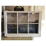 Old window backed with harbor scene