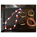 4 watches and a necklace