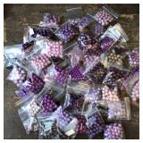 Large amount of smaller purple beads