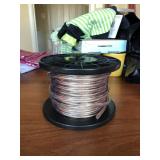 Spool of heavy gauge speaker wire.