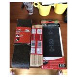 Sanding belts and screens. Two packs of shims.