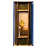 Yellow Flower Pot on a Pillar