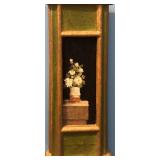 White Flower Pot on a Pillar