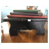 Stack of Wood Books on Stool