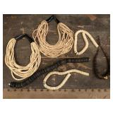 Neclaces mostly shell or ostrich egg