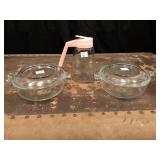 2 Pyrex and a syrup dispenser