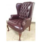 Button tufted upholstered wingback chair