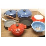 Group of cast iron cookware including Le Creuset