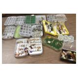 Group of assorted fishing flies in boxes