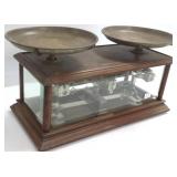 Antique cased scale with beveled glass