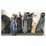 Large group of vintage golf clubs, bags & carts