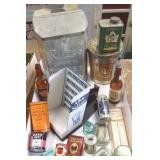 Group of advertising tins, bottles, etc