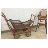Wicker perambulator & a caned bentwood high chair