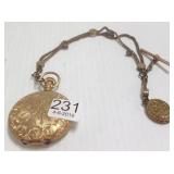 Waltham pocket watch in ornate hunters case