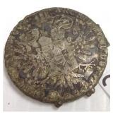 Antique silver coin in folding miniature frame