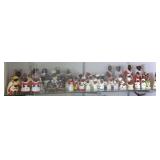 Group of black Americana figural salt & peppers
