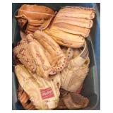 Group vintage leather store model baseball gloves