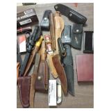 Group including hunting knives, knife sheaths &