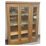 3-door oak bookcase- 1 side unfinished