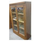 2-door oak bookcase- 1 side unfinished