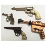 4 toy guns: 2 Gene Autry, space gun & a National