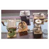 Group of antique coffee grinders
