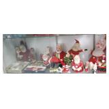 Large group of assorted Santa figures