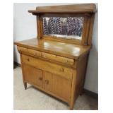 Antique buffet with beveled mirror