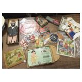 Group advertising paper items, cloth dolls, Our