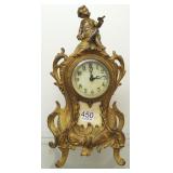 Antique cherub figural clock