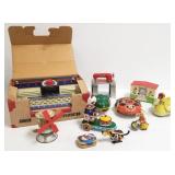 Group tin litho toys, typewriter, doghouse bank,