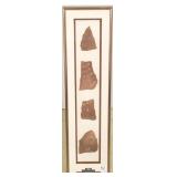 Frame w/ 4 petroglyph fragments 6" x 24" O.D.