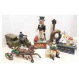 Brass horn & 5 cast iron items incl. mechanical