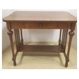 Oak library table w/ pressed carvings & drawer -