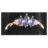 14k gold ring set with tanzanites & small